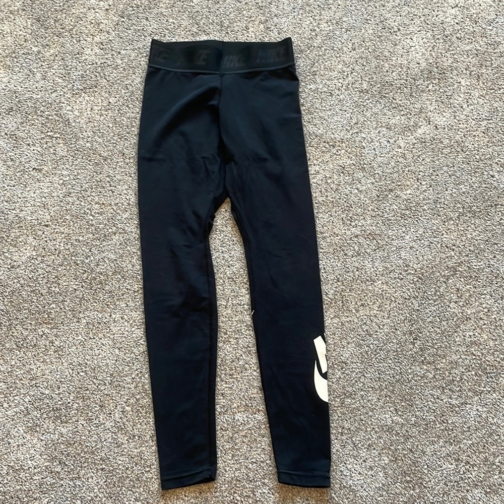Black Nike athletic pants; size small